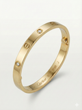Mira Gold Tone Bangle